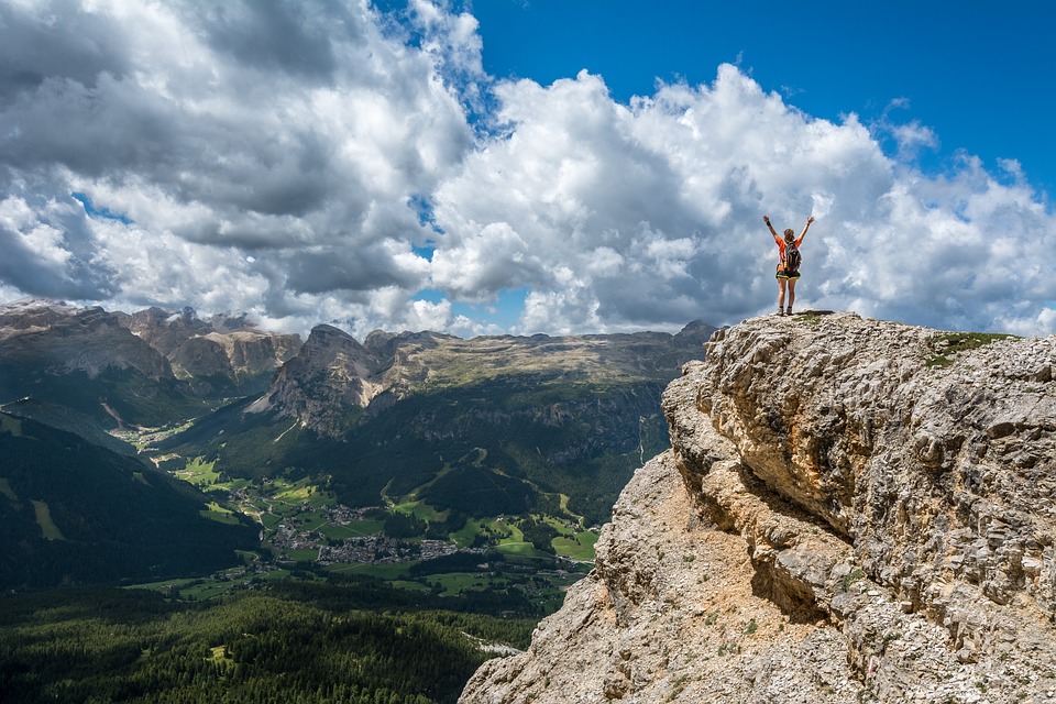 Person on top of the world