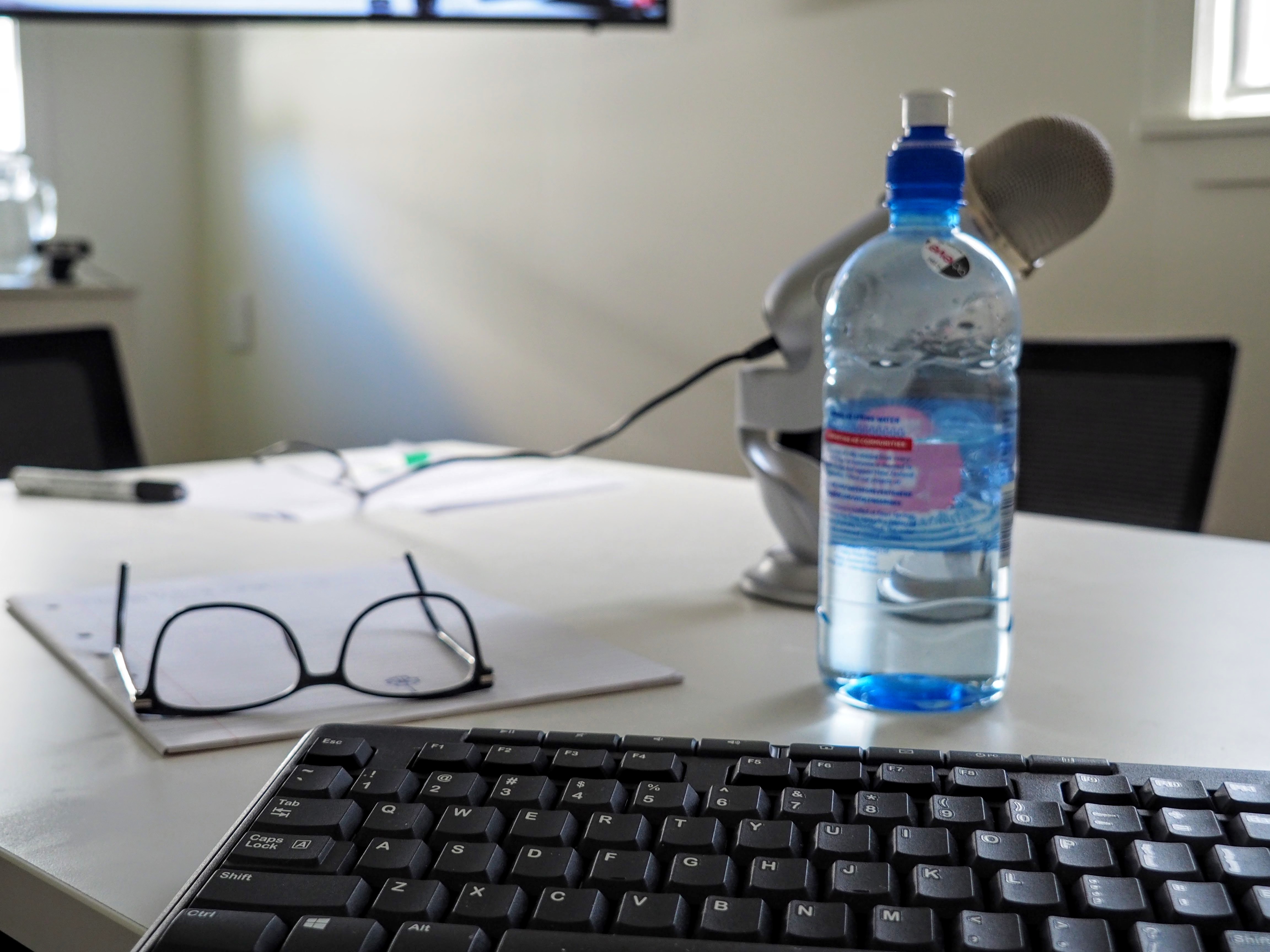 Glasses, keyboard, waterbottle