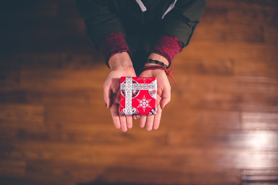 Person with Christmas gift