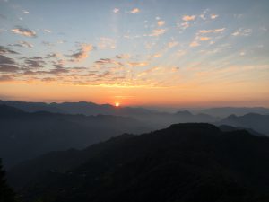 The sun rising over the Himalayas